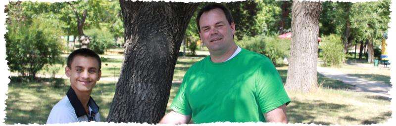 man and boy shaking hands