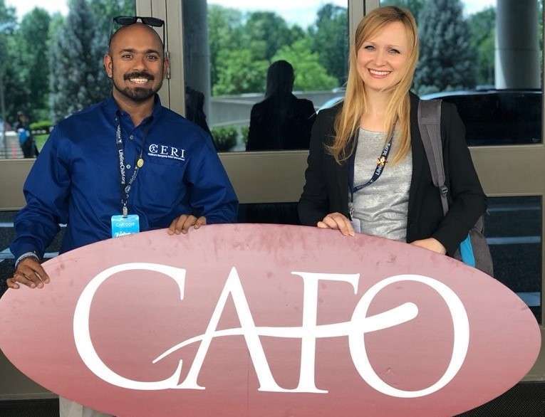 Ian Anand Forber Pratt (left), CERI's director of global advocacy, stands with Connie Belciug