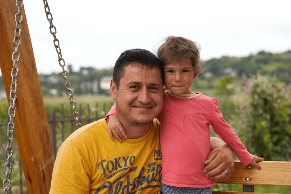 Father with foster child in Moldova