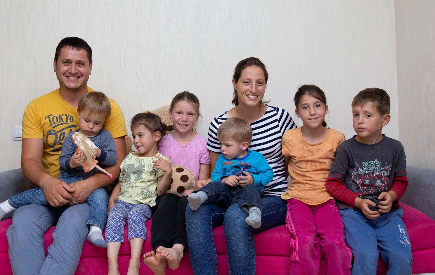 Moraru siblings with their foster family.